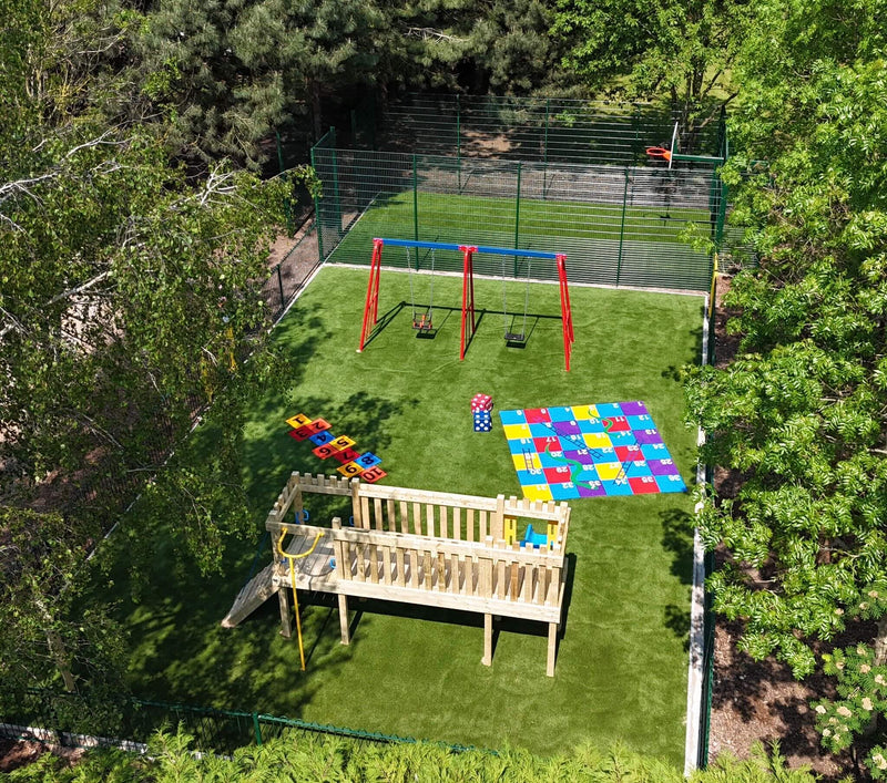 Outdoor play area with a basketball court