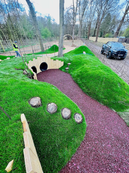 School playground with tunnels and rubber mulch